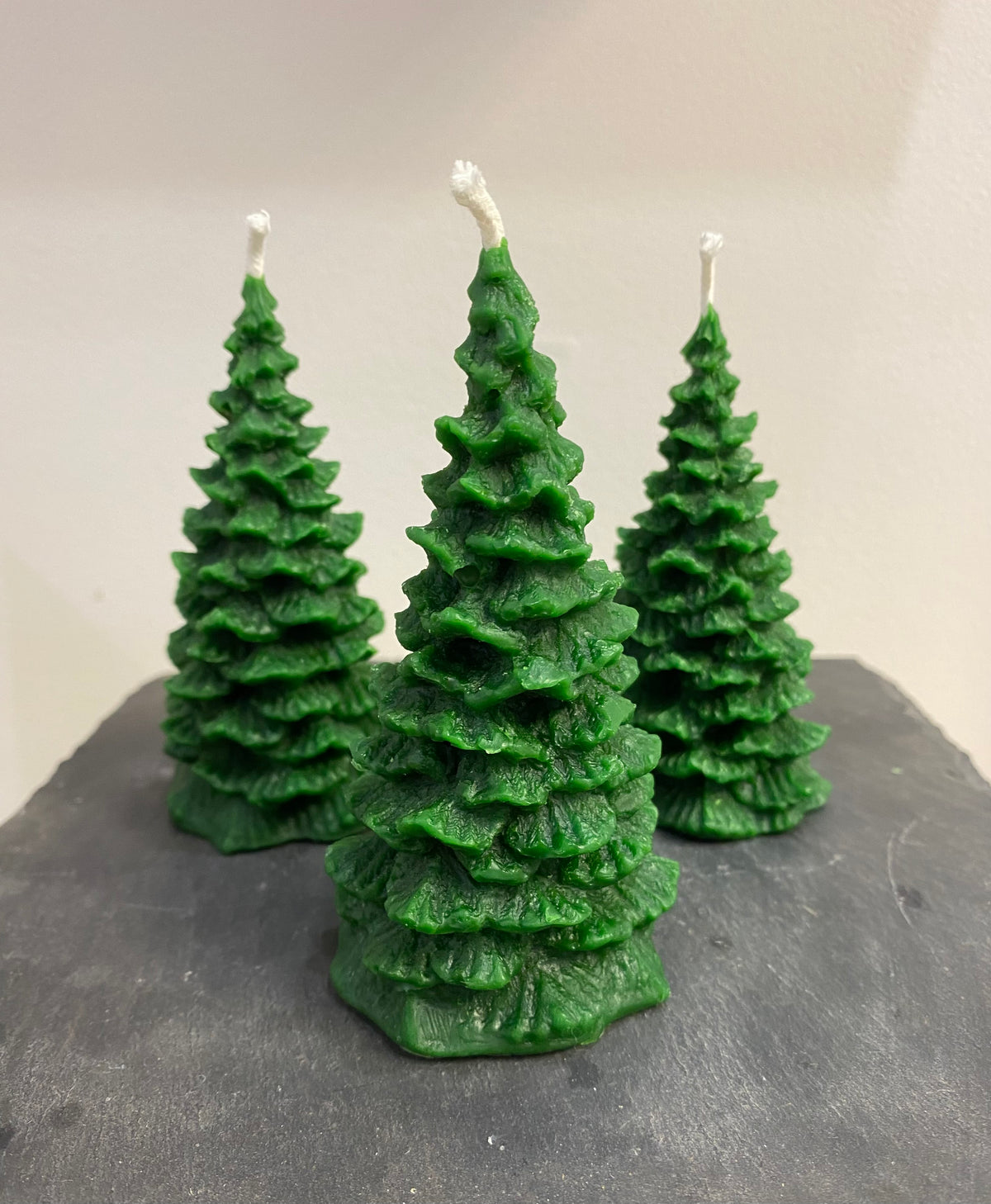 Christmas Tree Candle in green made with natural beeswax.