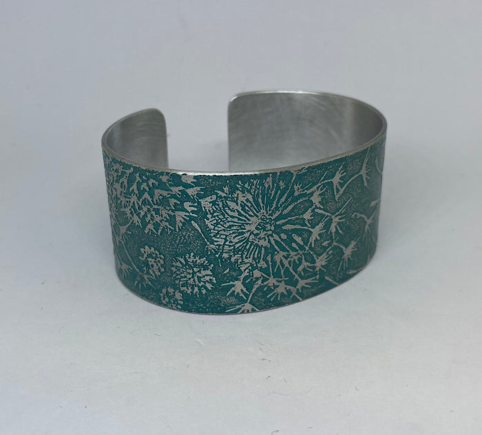 Teal Dandelion aluminium cuff - hand etched by Anna Roebuck from her original illustration.