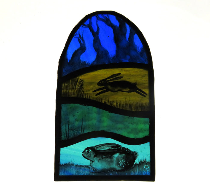 Two Hares - stained glass panel by Debra Eden