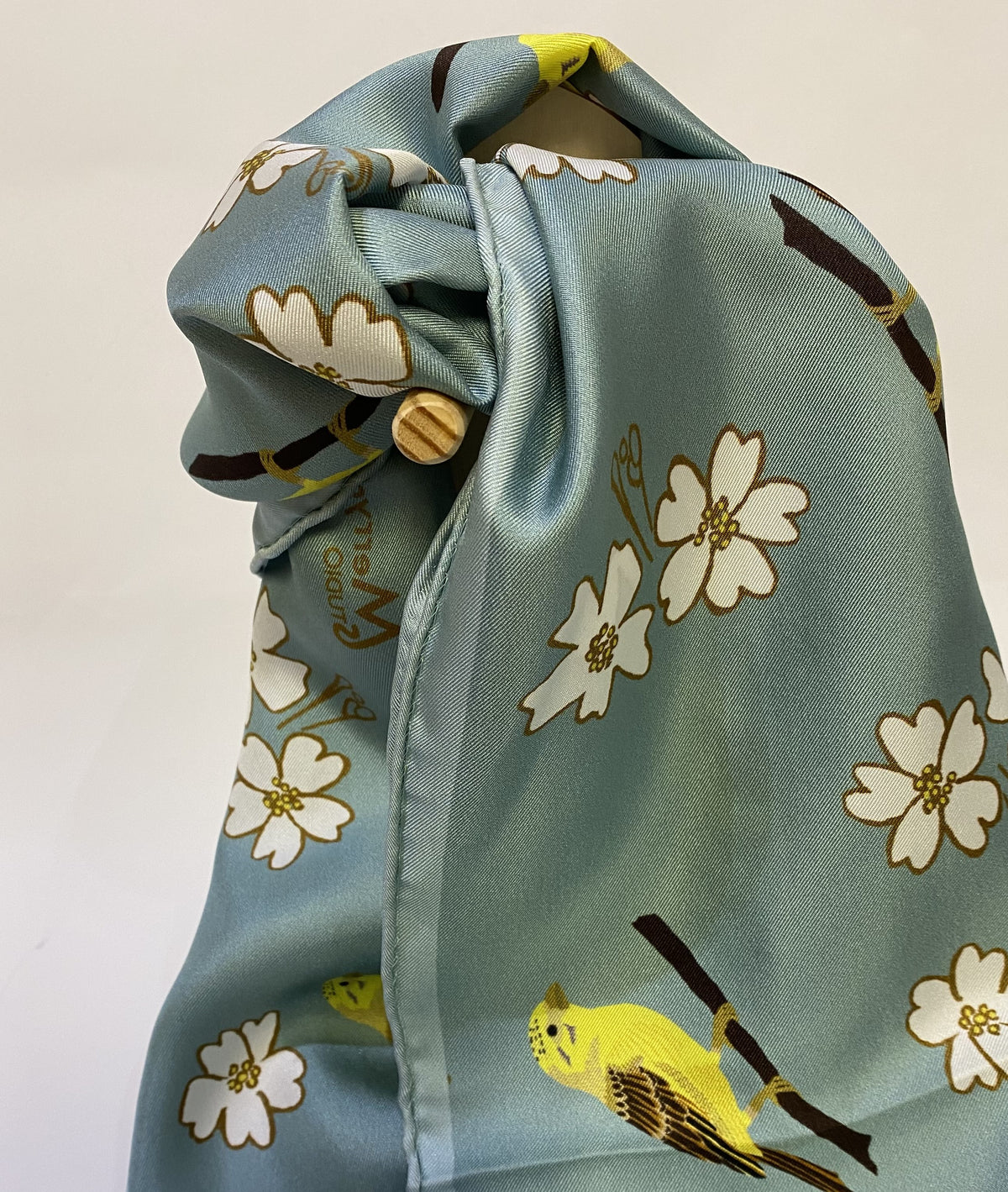 Long, luxurious 100% silk scarf with a yellowhammer bird and flower design by Faye Stevens.