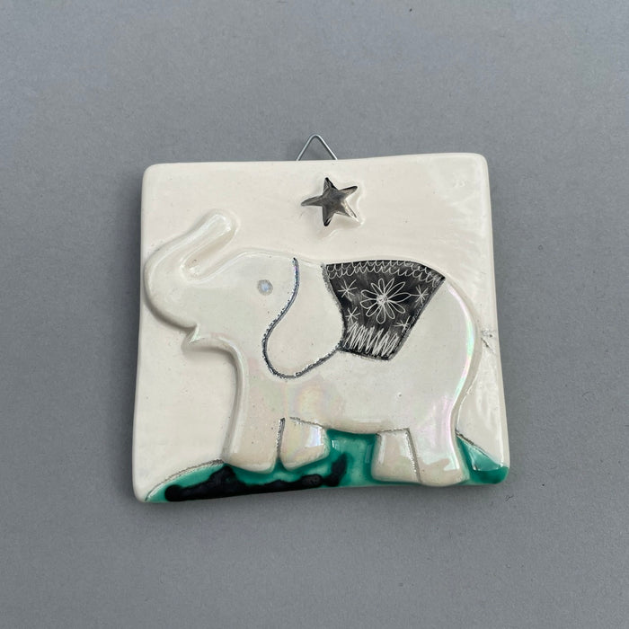 Elephant and platinum star hanging tile by Sophie Smith