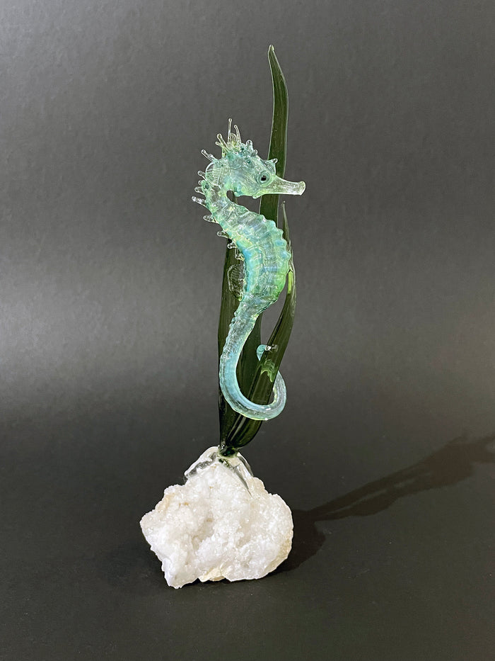 Glass seahorse on quartz by Sandra Young