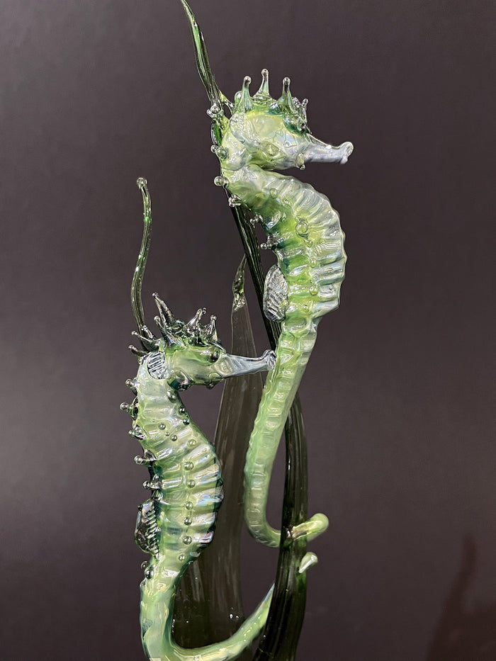 Small Green Seahorses on Quartz by Sandra Young