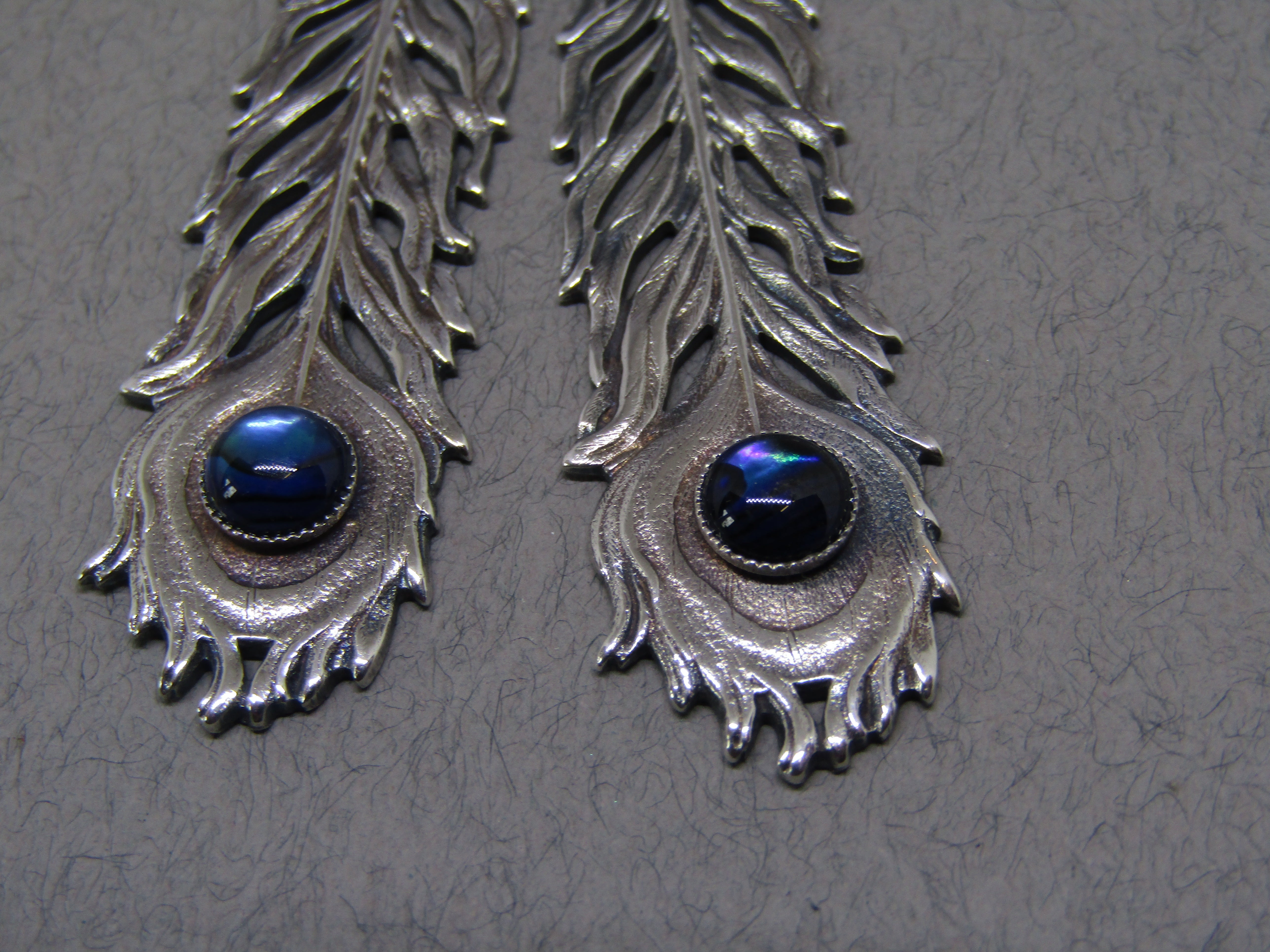 Silver drop earrings on sale with blue stone